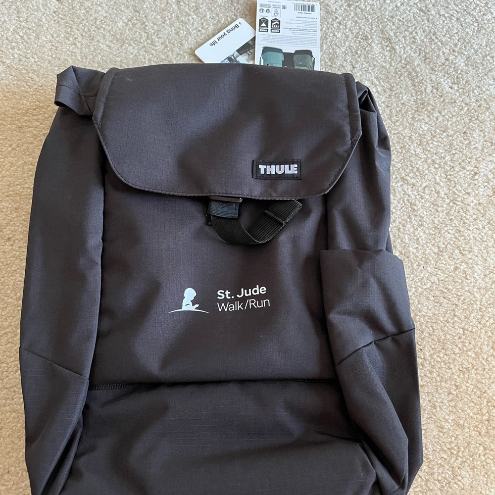 Thule Black Backpack with Durable Fabric and Streamlined Design